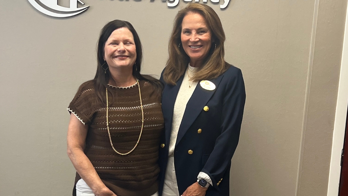 Linda with clients on closing day