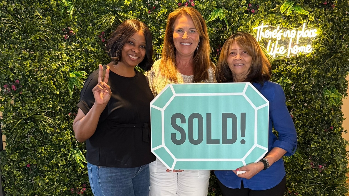Linda with clients